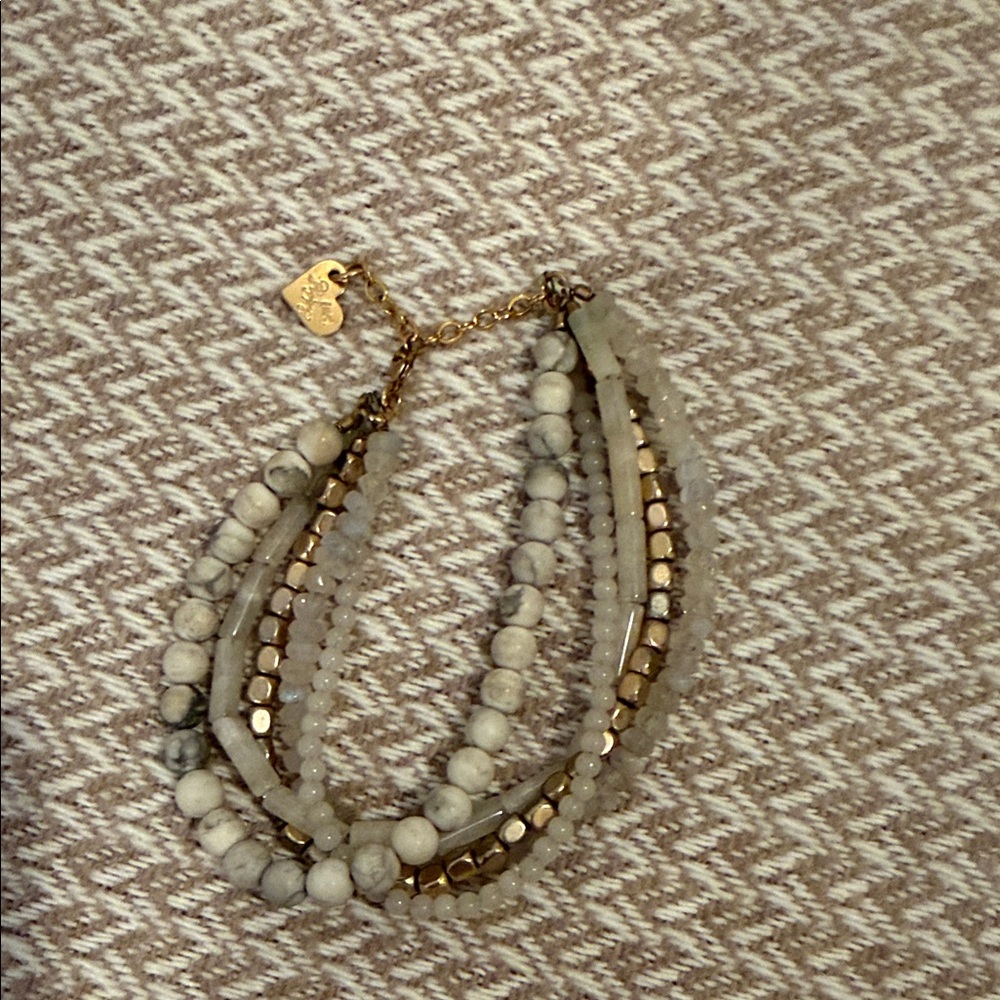 Elegant Multi-Strand bracelet with Gold and Cream Beads